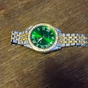 Green fancy faced watch